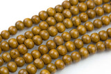 Natural Cream Colored Tan Semi Gloss Wood Off Round Shaped Beads with 2mm Holes - Sold by 15.5" Strands Gemstone Beads