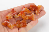 Carnelian Goldfish Figurine About 0.8 across Pre-charged- drilled on top to attach to string.