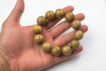 Wood Bracelet- One size fits all- On strong stretchy string-Buddhist Prayer Bracelet- 18mm