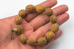 Walnut Seed Bracelet- One size fits all- On strong stretchy string-Buddhist Prayer Bracelet- 14x19mm