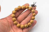 Silk Wood Bracelet- One size fits all- On strong stretchy string-Buddhist Prayer Bracelet- 12mm