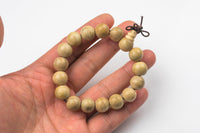 Silk Wood Bracelet- One size fits all- On strong stretchy string-12mm- Buddhist Prayer Bracelet