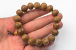 Seed Bracelet- One size fits all- On strong stretchy string-Buddhist Prayer Bracelet- 14x19mm