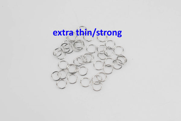 White Gold Silver Toned SUPER STRONG/ Extra THIN Jump Rings 3mm 4mm 5mm. Carbon Steel - Very sturdy despite thickness.