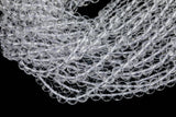 Natural Brazilian Clear Quartz Round beads. One full strand. 6mm, 8mm, or 10mm. Smooth Gemstone Beads