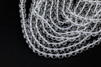 Natural Brazilian Clear Quartz Round beads. One full strand. 6mm, 8mm, or 10mm. Smooth Gemstone Beads