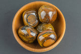 Natural Tiger Eye Tiger's Eye Tigers Eye Tumbled Nuggets- 100 grams-3.5 ounces - .5 inch-1.5 inch Size- Roughly 7 pcs per bag