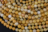 Natural Yellow Jade- Faceted Round sizes. 4mm, 6mm, 8mm, 10mm, 12mm, 14mm- Full 15.5 Inch Strand AAA Quality Gemstone Beads