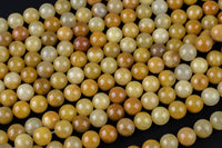 Natural Yellow Jade- Round sizes. 4mm, 6mm, 8mm, 10mm, 12mm, 14mm- Full 15.5 Inch Strand AAA Quality Smooth Gemstone Beads