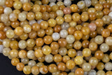 Natural Yellow Jade- Faceted Round sizes. 4mm, 6mm, 8mm, 10mm, 12mm, 14mm- Full 15.5 Inch Strand AAA Quality Gemstone Beads