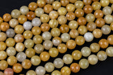 Natural Yellow Jade- Faceted Round sizes. 4mm, 6mm, 8mm, 10mm, 12mm, 14mm- Full 15.5 Inch Strand AAA Quality Gemstone Beads