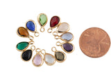 Petite tiny crystal charms teardrop 6*8mm. Bezzeled with gold plated copper / brass.