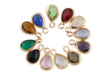 Petite tiny crystal charms teardrop 6*8mm. Bezzeled with gold plated copper / brass.