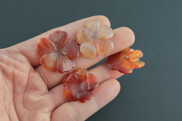 Carnelian 3d Flower Figurine About 24mm across Pre-charged- drilled on top to attach to string.