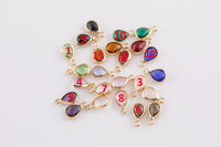 Petite tiny crystal charms teardrop 6*8mm. Bezzeled with gold plated copper / brass.