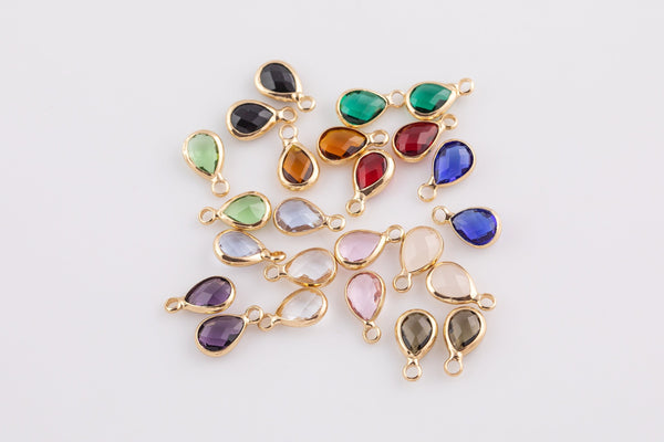 Petite tiny crystal charms teardrop 6*8mm. Bezzeled with gold plated copper / brass.