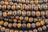 LARGE-HOLE beads!!! 8mm or 10mm smooth-finished round. 2mm hole. 7-8" strands. Smooth Tiger's Eye. Tiger eye. Big Hole Beads