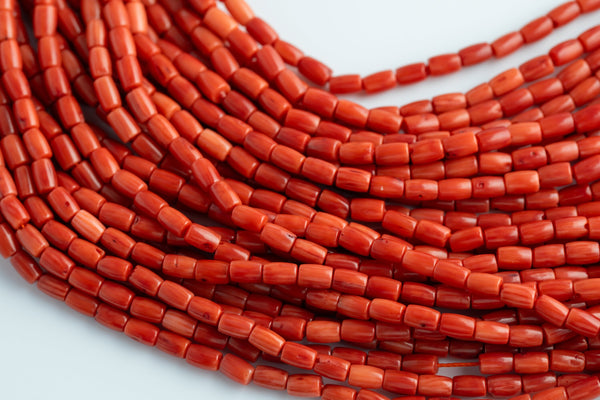 Orange Bamboo Coral Barrel Shaped Beads- 3x5mm. A Quality 15.5 inch strand