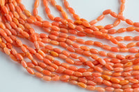 Orange Bamboo Coral Barrel Shapped Beads- 3x6mm. A Quality 15.5 inch strand