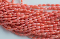 Orange Bamboo Coral Barrel Shapped Beads- 3x6mm. A Quality 15.5 inch strand