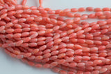 Orange Bamboo Coral Barrel Shapped Beads- 3x6mm. A Quality 15.5 inch strand