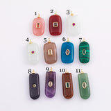 Natural stone pendant charm with crystal in the middle - gold plated brass bail