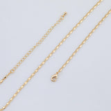 May include: Gold-colored necklace with a delicate chain design. The necklace features a lobster clasp closure and an adjustable chain. The chain has a series of small, rectangular links. The necklace is displayed on a white background.