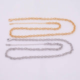 May include: Two necklaces with a chain link design. One necklace is gold-colored, and the other is silver-colored. Both necklaces have a lobster clasp closure and an extender chain.