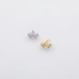 May include: Two heart-shaped pendants. One is silver-toned and encrusted with clear crystals. The other is gold-toned and also features clear crystals. Both pendants have a small loop at the top for attaching to a chain or bracelet.