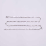 May include: A silver-colored necklace with a delicate chain design. The necklace features a series of rectangular links connected by smaller, circular links. It includes a clasp closure and an adjustable chain for length.