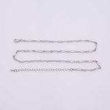 May include: A silver-colored necklace with a delicate chain design. The necklace features a series of rectangular links connected by smaller, circular links. It includes a clasp closure and an adjustable chain for length.