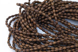 Wood Rice Shape Beads 5x7mm- 15 inches per strand