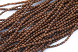 Wood Rice Shape Beads 5x6mm- 15 inches per strand