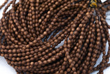 Wood Rice Shape Beads 5x6mm- 15 inches per strand