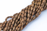 Wood Rice Shape Beads 7x14mm- 15 inches per strand