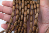 Wood Rice Shape Beads 7x14mm- 15 inches per strand