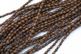 Wood Rice Shape Beads 5x7mm- 15 inches per strand