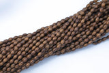 Wood Rice Shape Beads 5x7mm- 15 inches per strand