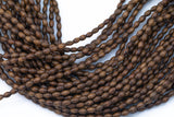 Wood Rice Shape Beads 5x7mm- 15 inches per strand
