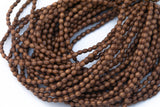 Wood Rice Shape Beads 5x6mm- 15 inches per strand