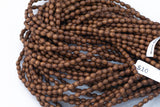 Wood Rice Shape Beads 5x6mm- 15 inches per strand