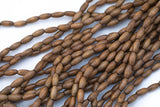 Wood Rice Shape Beads 7x14mm- 15 inches per strand