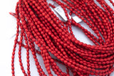 Wood Rice Shape Beads 7x14mm- 15 inches per strand
