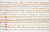 May include: Fourteen distinct gold-toned metal chains arranged horizontally, each labeled with a red number from 1 to 14. The chains feature various link styles, including elongated paperclip links, oval links, and textured surfaces in gold metal.