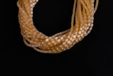 Cats Eye- Selenite Quartz- High Quality in Smooth Barrel 4x6mm- Full Strand 15.5 inches Long- Light Champagne
