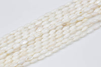 Natural Shell Puffy Rice  Beads. A Quality 15.5 iinch strand-Full Strand 15.5 inch Strand