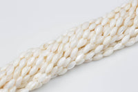 Natural Shell Puffy Rice  Beads. A Quality 15.5 iinch strand-Full Strand 15.5 inch Strand