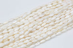 Natural Shell Puffy Rice  Beads. A Quality 15.5 iinch strand-Full Strand 15.5 inch Strand