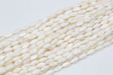 Natural Shell Puffy Rice  Beads. A Quality 15.5 iinch strand-Full Strand 15.5 inch Strand