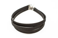 Suede Choker 13.5 inches adjustable 2 inches.